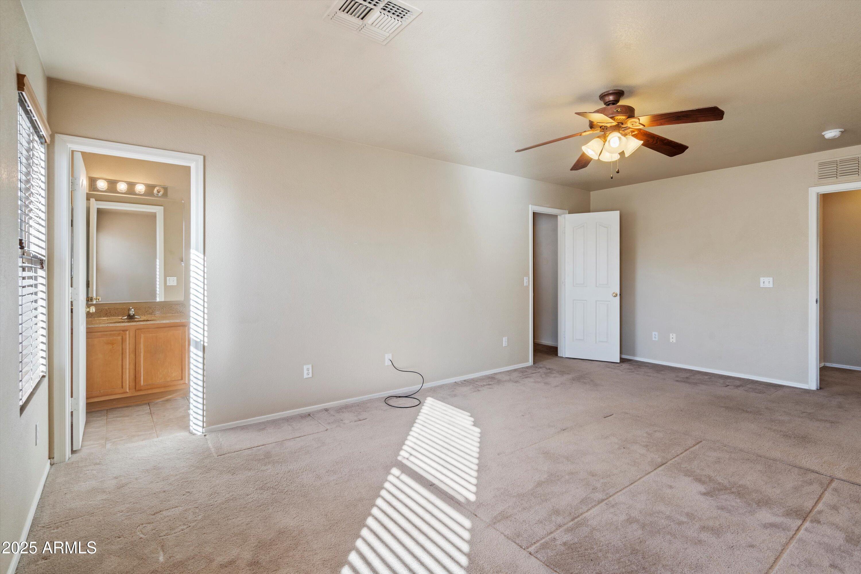 3027 West Red Fox Road Phoenix, AZ 85083 - Photo 14 of 27 16-Primary Bedroom
