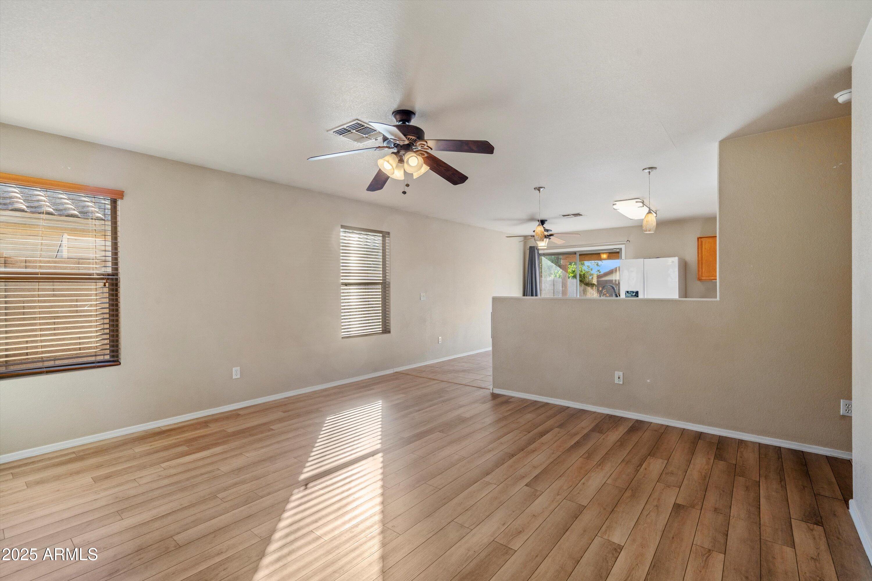 3027 West Red Fox Road Phoenix, AZ 85083 - Photo 8 of 27 08-Living to Kitchen