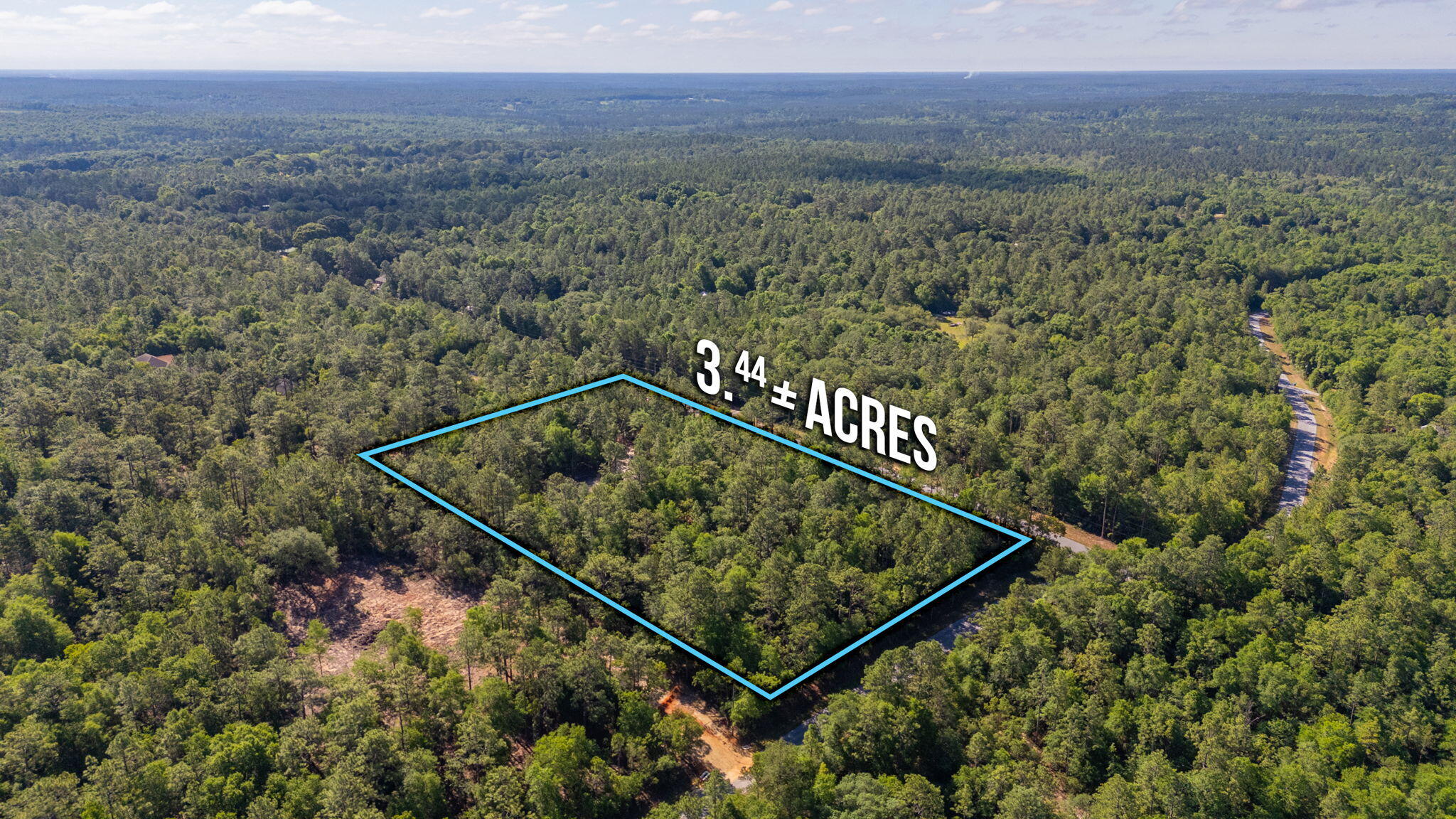4449 Yellow Bluff Road Crestview, FL 32539 - Photo 20 of 42 a view of a field with a forest