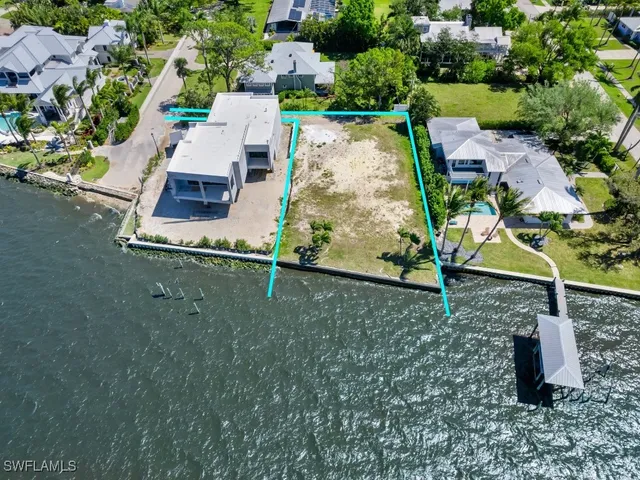 an aerial view of residential house with outdoor space