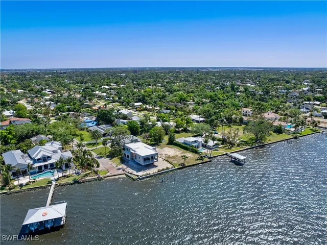 an aerial view of a city with lots of residential buildings