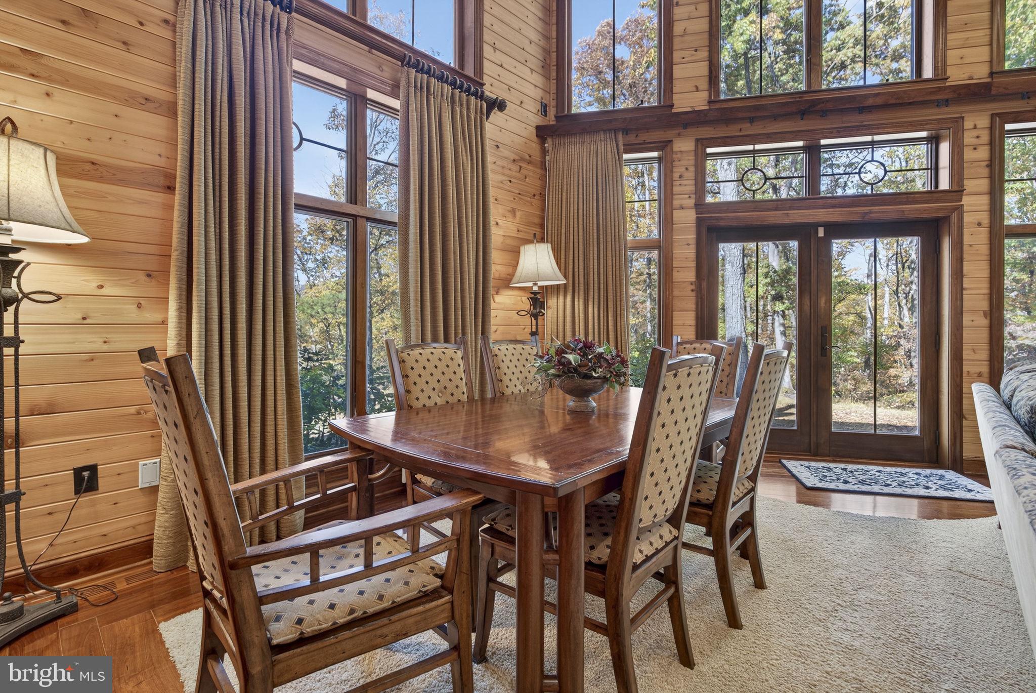 1631 Back Mountain Road Winchester, VA 22602 - Photo 12 of 86 a view of a dining room with furniture and front door