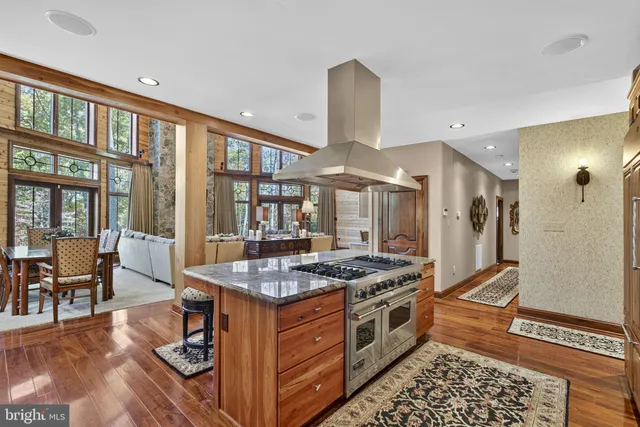 a bathroom with double vanity sinks and a large mirror