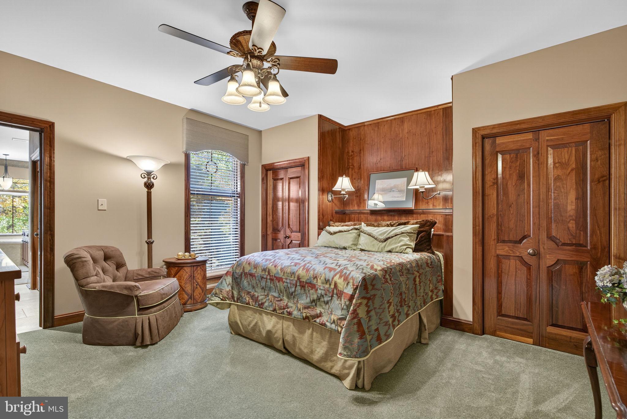 1631 Back Mountain Road Winchester, VA 22602 - Photo 21 of 86 a bedroom with a bed and ceiling fan