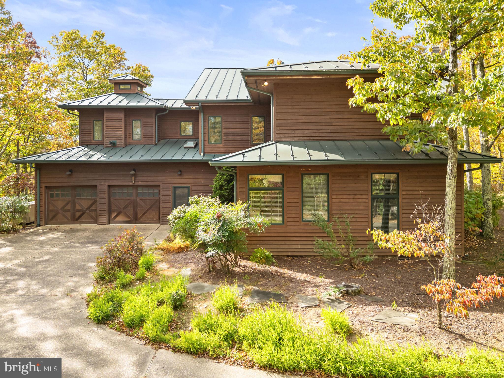 1631 Back Mountain Road Winchester, VA 22602 - Photo 3 of 86 a front view of a house with a yard
