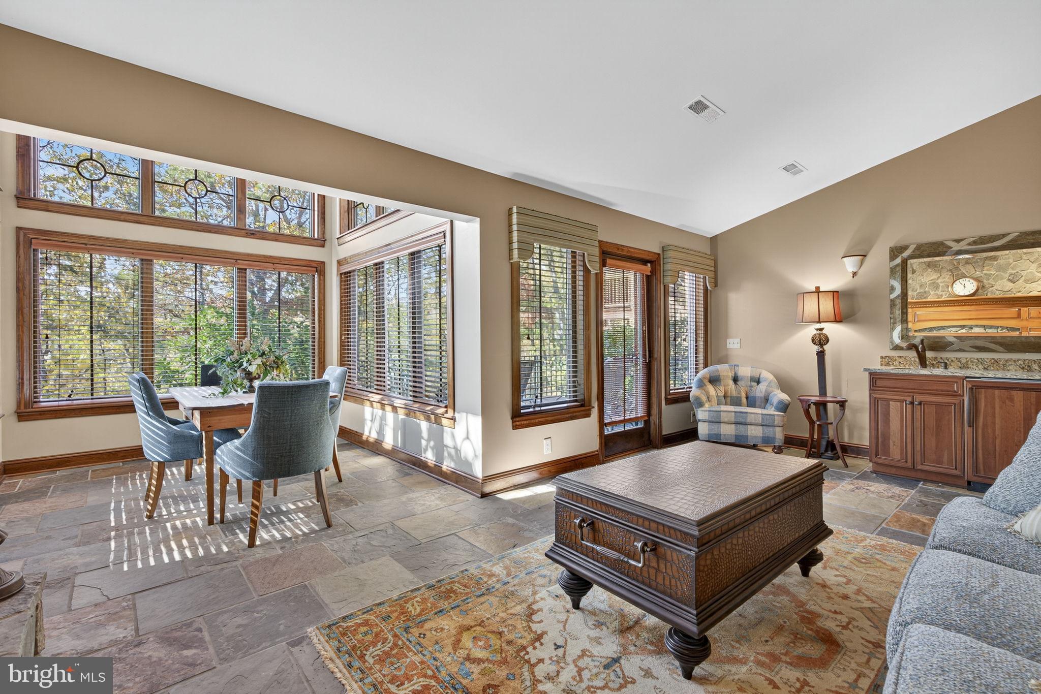 1631 Back Mountain Road Winchester, VA 22602 - Photo 38 of 86 a living room with furniture and large windows