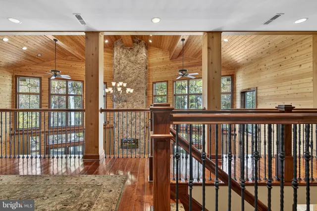front view of a brick house with a large windows