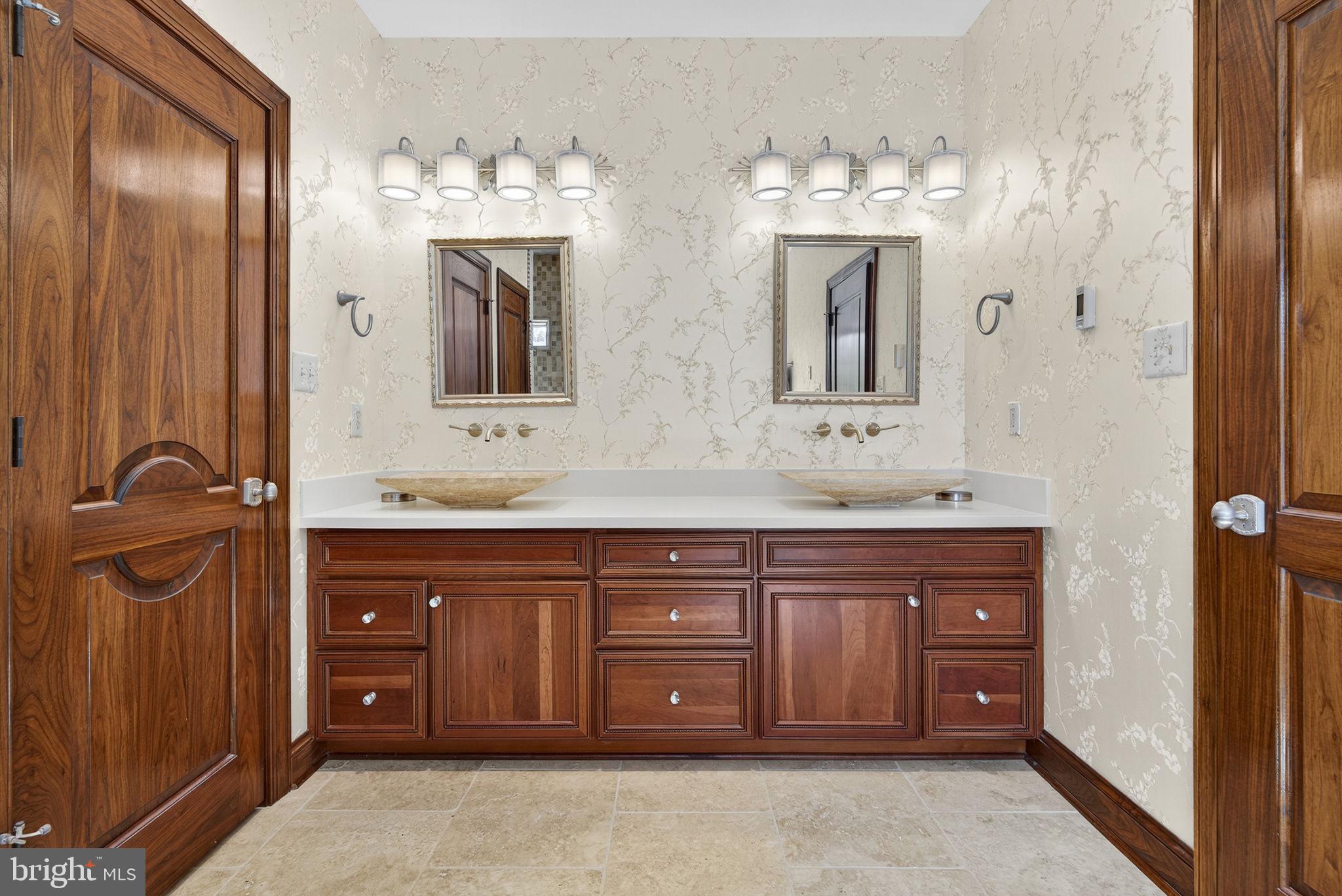 1631 Back Mountain Road Winchester, VA 22602 - Photo 52 of 86 a spacious bathroom with a double vanity sink and a mirror