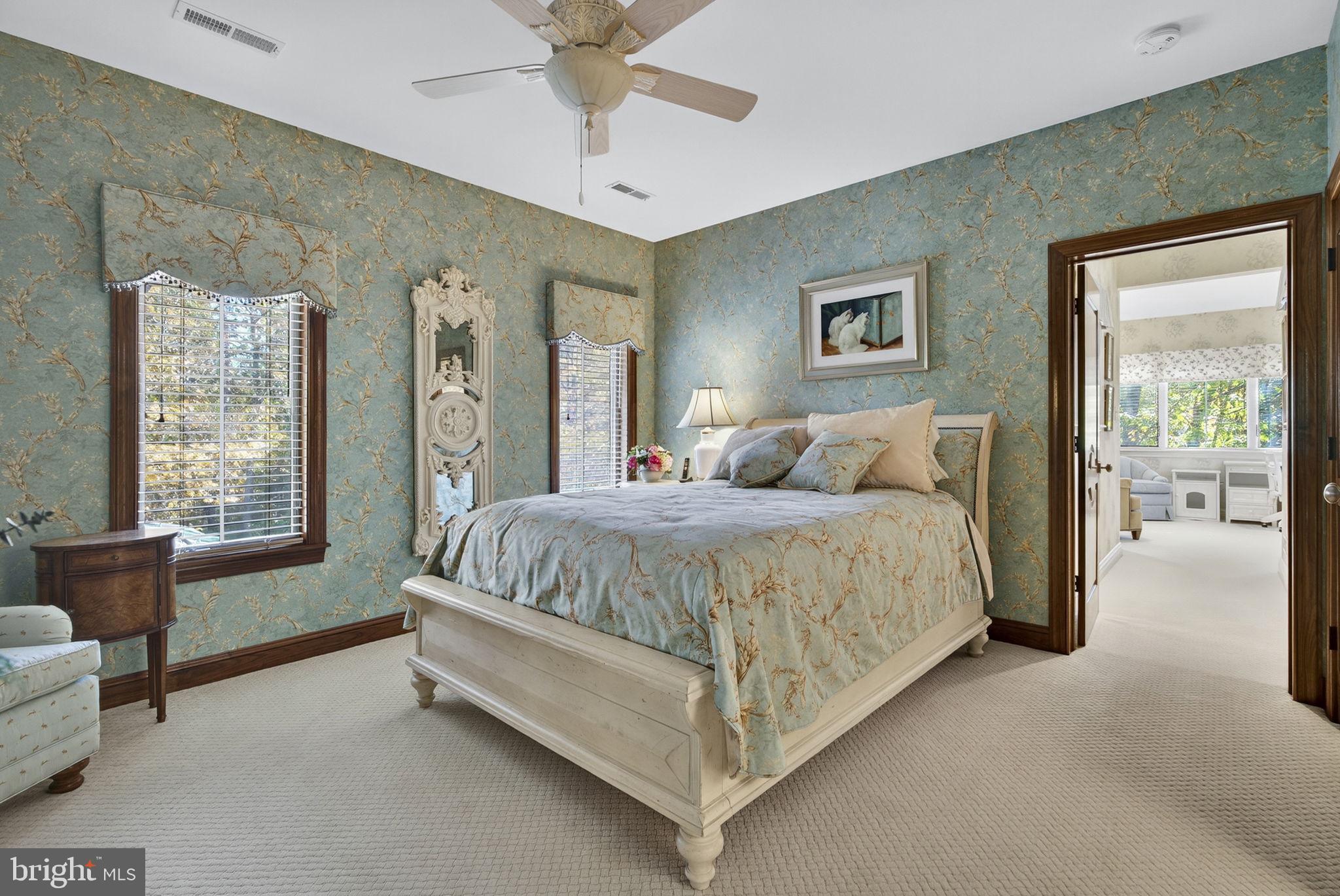 1631 Back Mountain Road Winchester, VA 22602 - Photo 56 of 86 a spacious bedroom with a bed and a couch