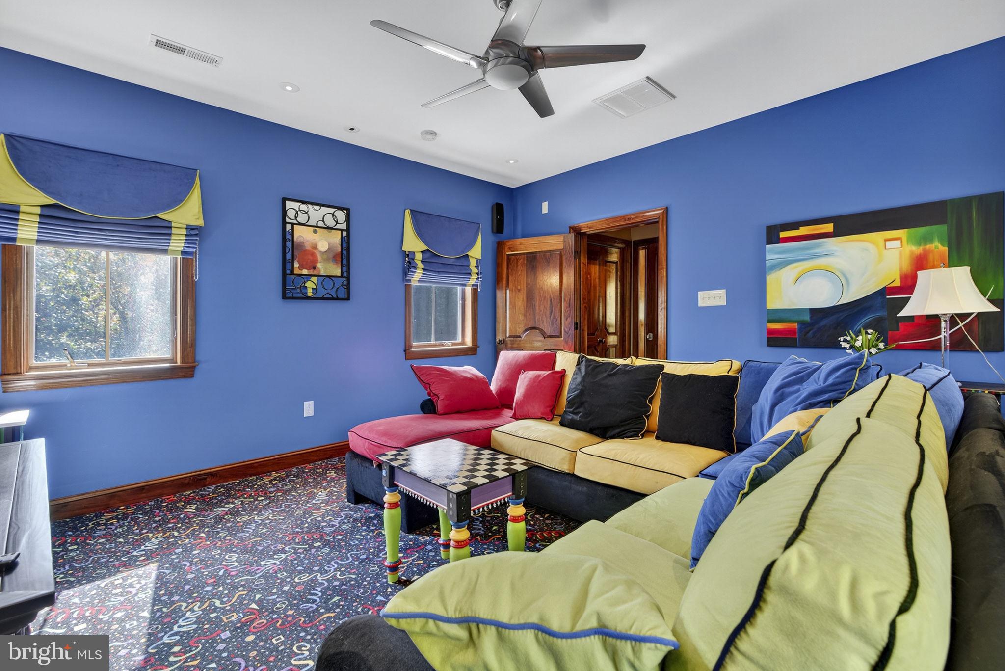 1631 Back Mountain Road Winchester, VA 22602 - Photo 64 of 86 a living room with furniture and a flat screen tv