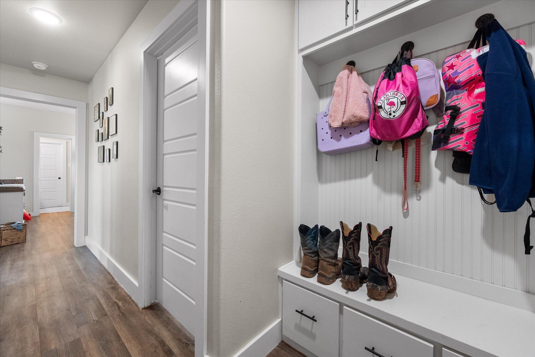 3263 Quail Road Lubbock, TX 79407 - Photo 28 of 46 a view of a room with rack on the wall and dresser