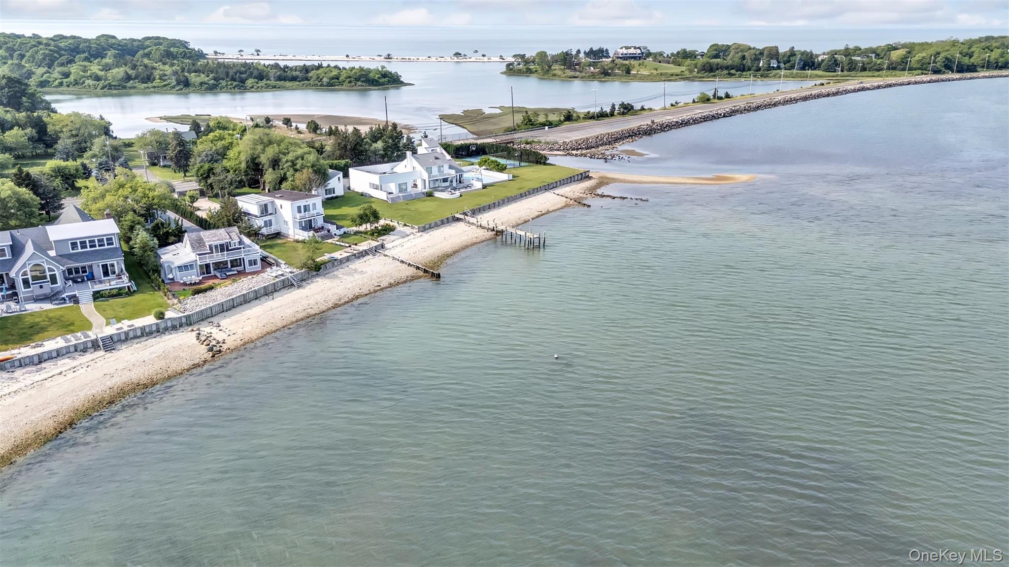 12910 Main Road East Marion, NY 11939 - Photo 2 of 41 a view of a lake with a city view