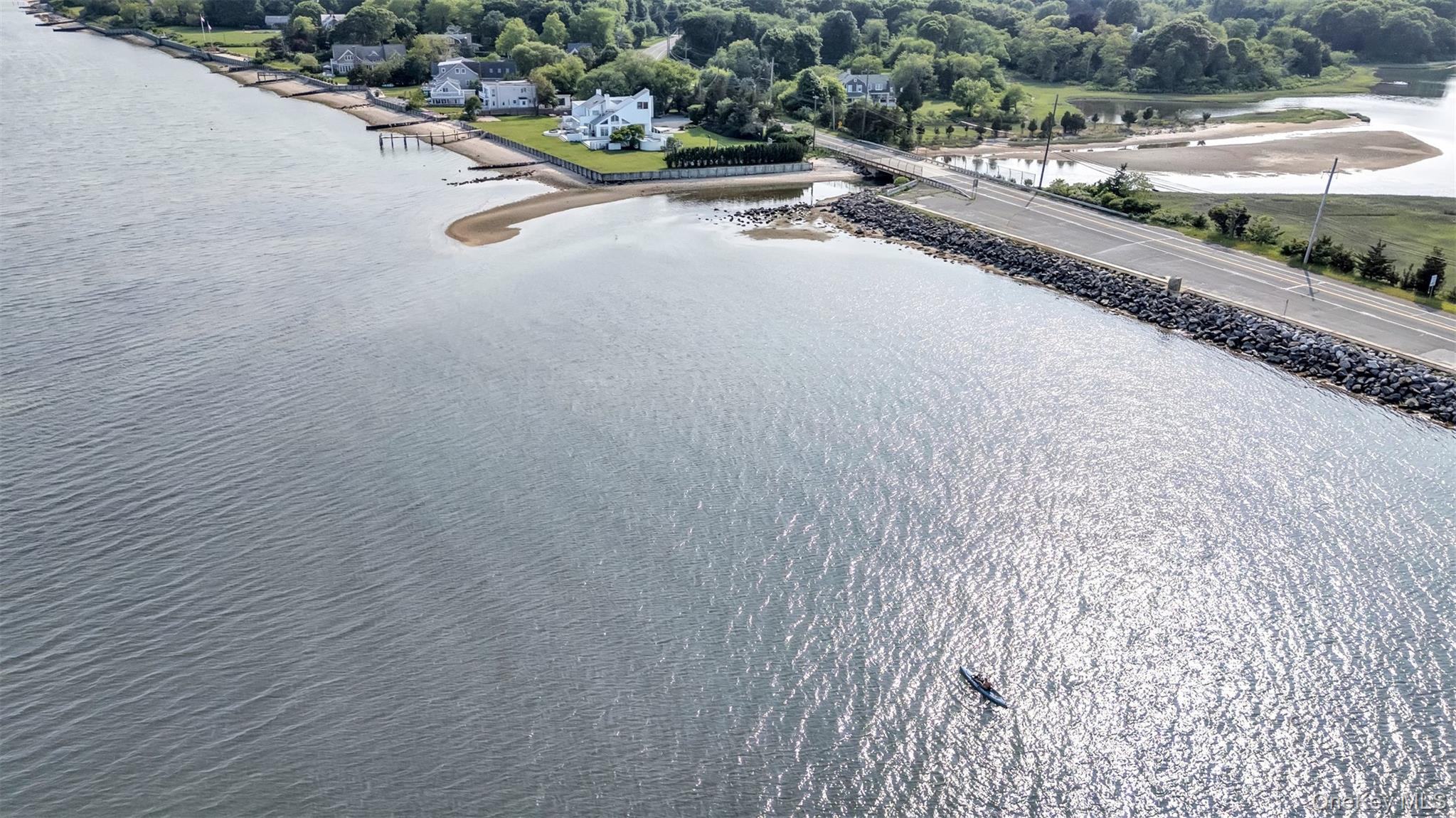 12910 Main Road East Marion, NY 11939 - Photo 7 of 41 a view of a street with a road