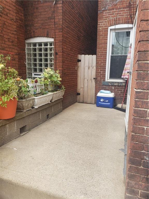 4218 Calvin Street Pittsburgh, PA 15201 - Photo 23 of 25 Court Yard facing the Front House, the gated walkway is to Calvin Street.