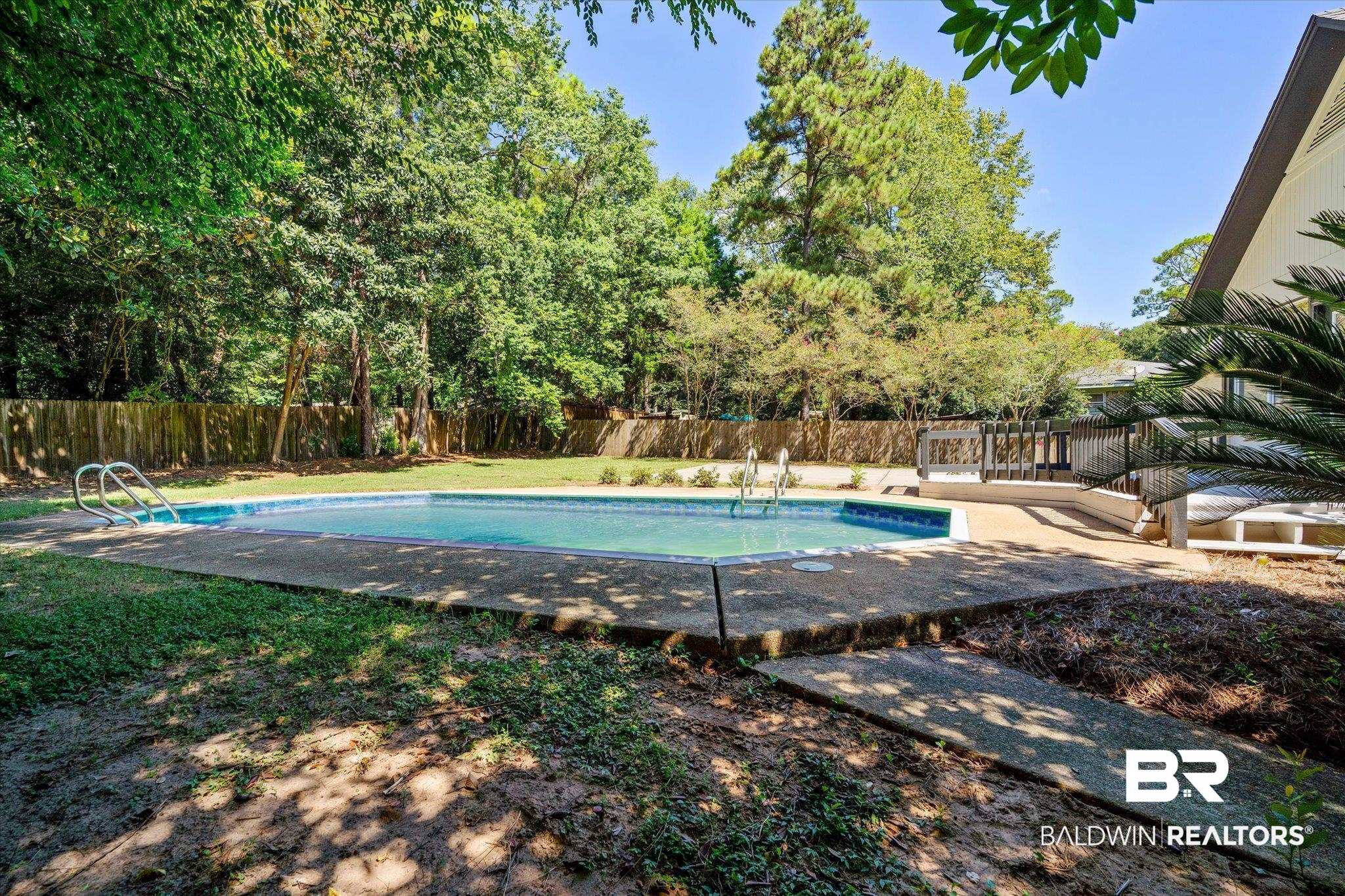 308 Byron Avenue West Mobile, AL 36609 - Photo 17 of 33 View of swimming pool featuring a patio