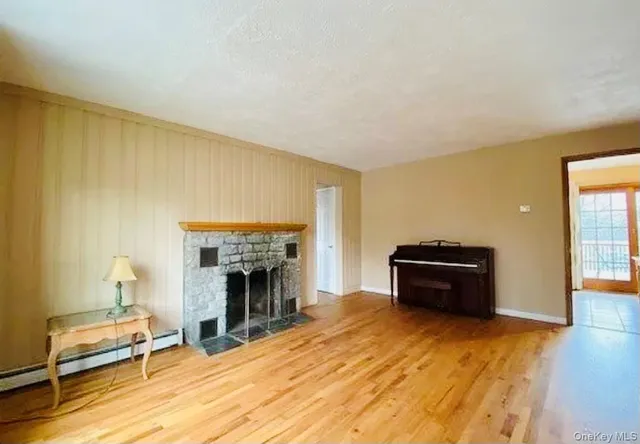 a room with furniture and a fireplace