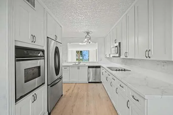 a view of wooden floor in an empty room