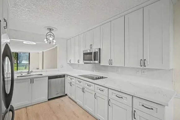 an aerial view of a houses and an outdoor space