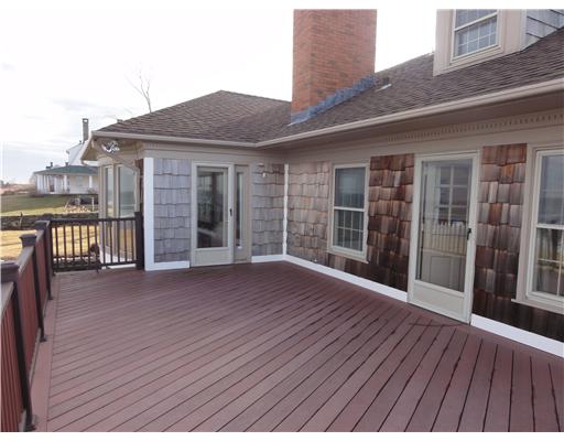 276 Ocean Road Narragansett, RI 02882 - Photo 5 of 19 Exterior Front. Oversized rear deck for entertaining overlooking the breaking surf , panoramic views as far as the eye can see to the east and the south .