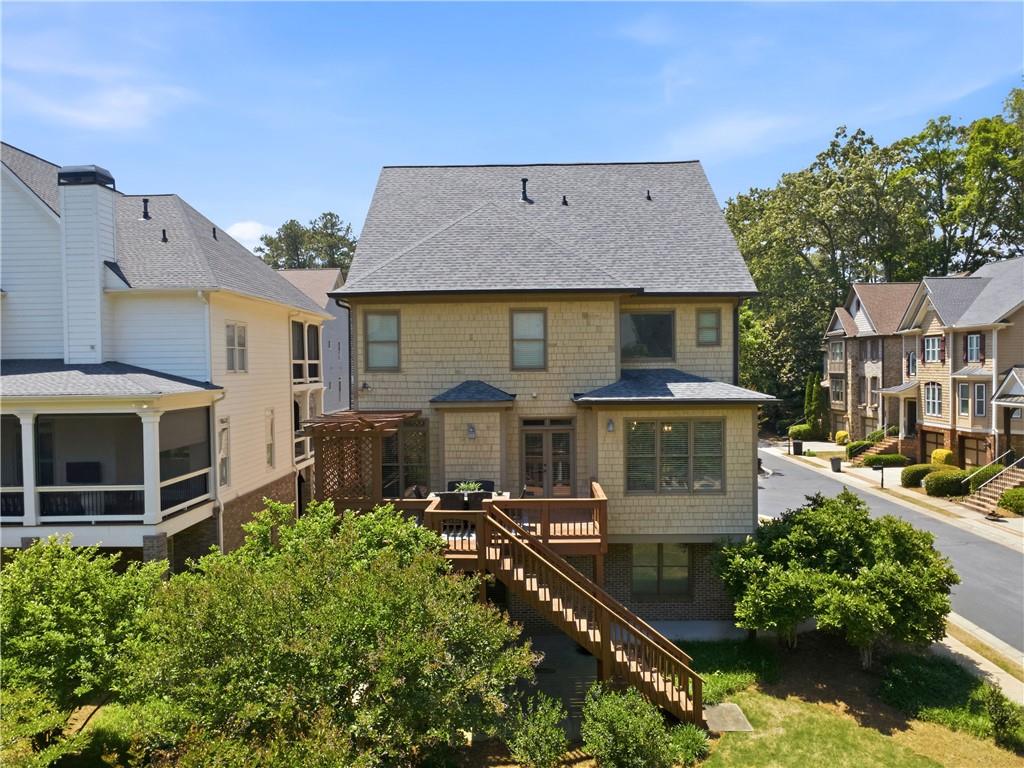 7988 Magnolia Square Atlanta, GA 30350 - Photo 33 of 33 an aerial view of a house with balcony yard and outdoor seating