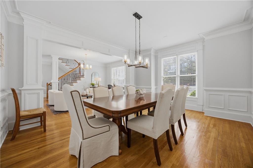 7988 Magnolia Square Atlanta, GA 30350 - Photo 5 of 33 a view of a dining room with furniture window and wooden floor