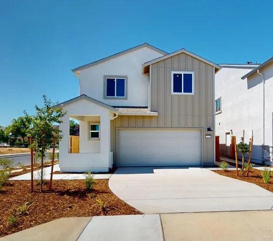 a front view of a house with entertaining space