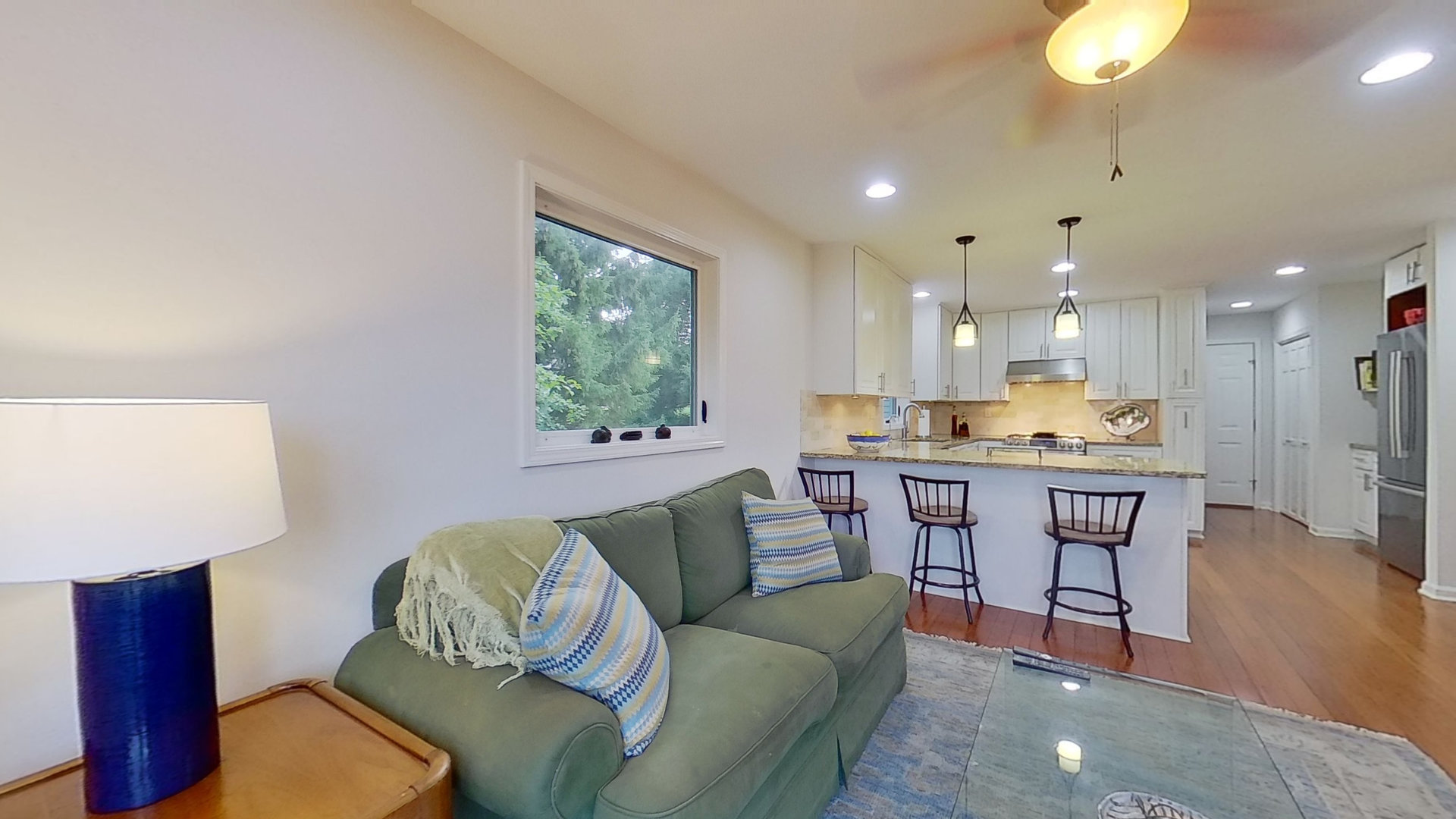 2N455 LaFox Road Elburn, IL 60119 - Photo 17 of 60 a living room with kitchen island furniture and a window