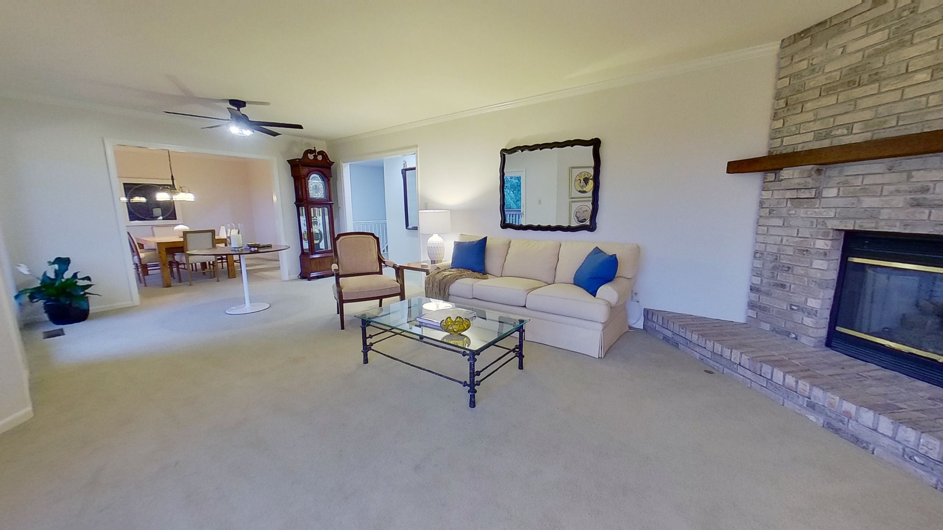 2N455 LaFox Road Elburn, IL 60119 - Photo 20 of 60 a living room with furniture and a fireplace