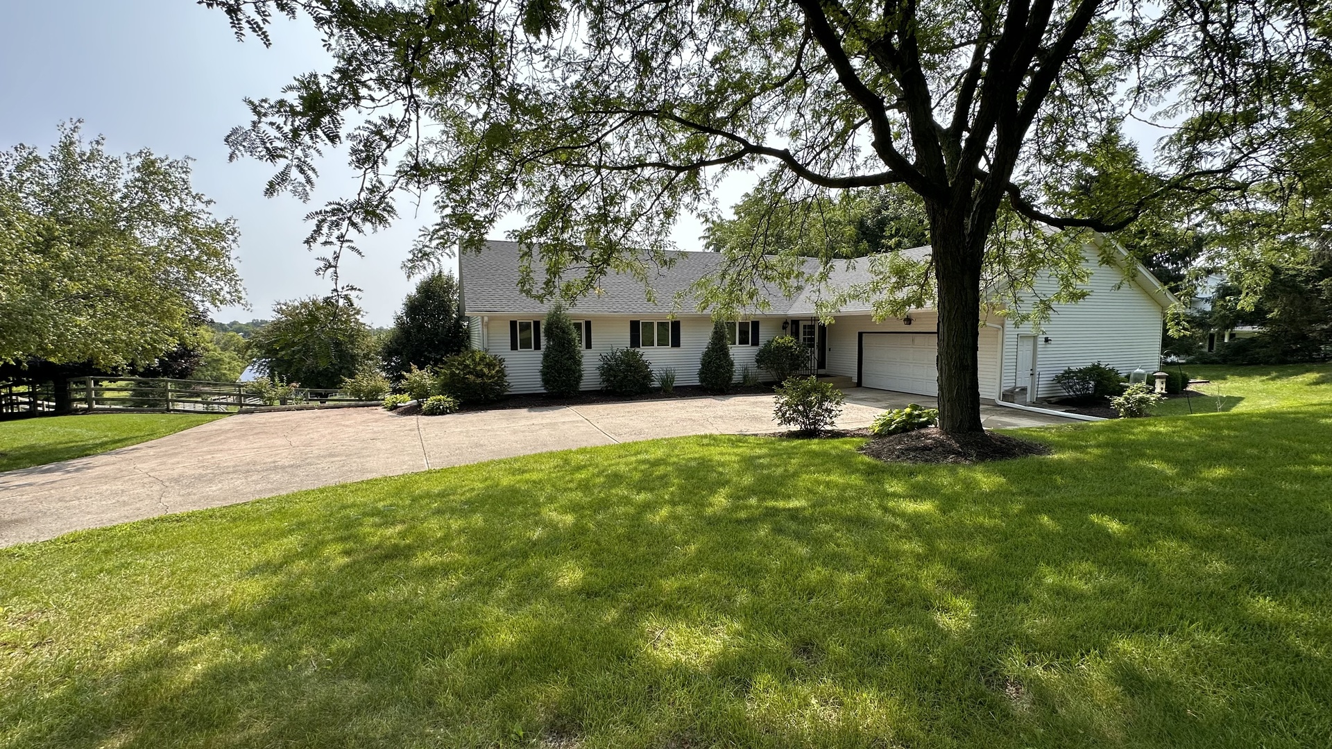 2N455 LaFox Road Elburn, IL 60119 - Photo 52 of 60 a view of a house with a big yard and large trees
