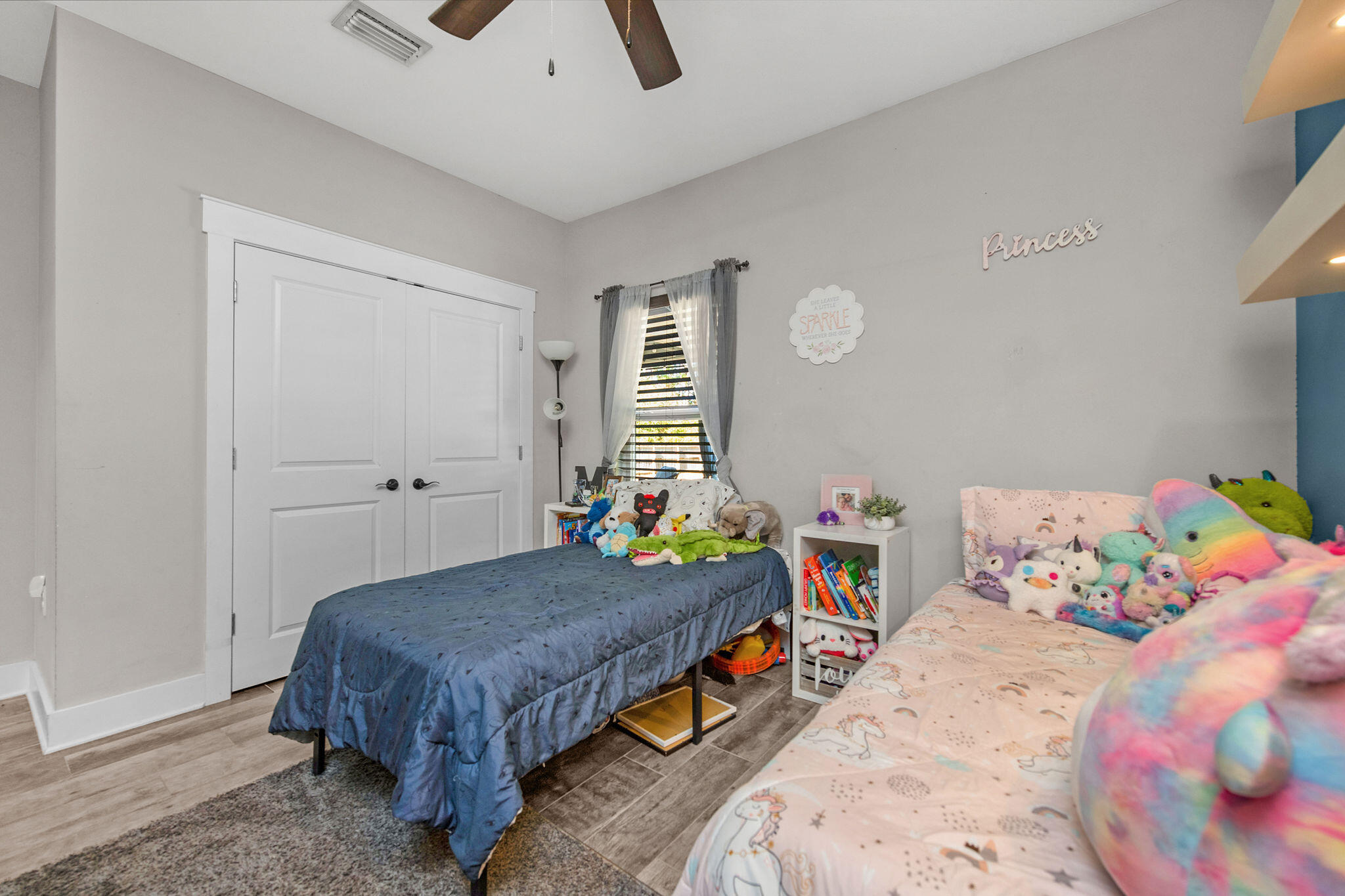 8914 Timber Lane Navarre, FL 32566 - Photo 27 of 40 a bedroom with bed and a window