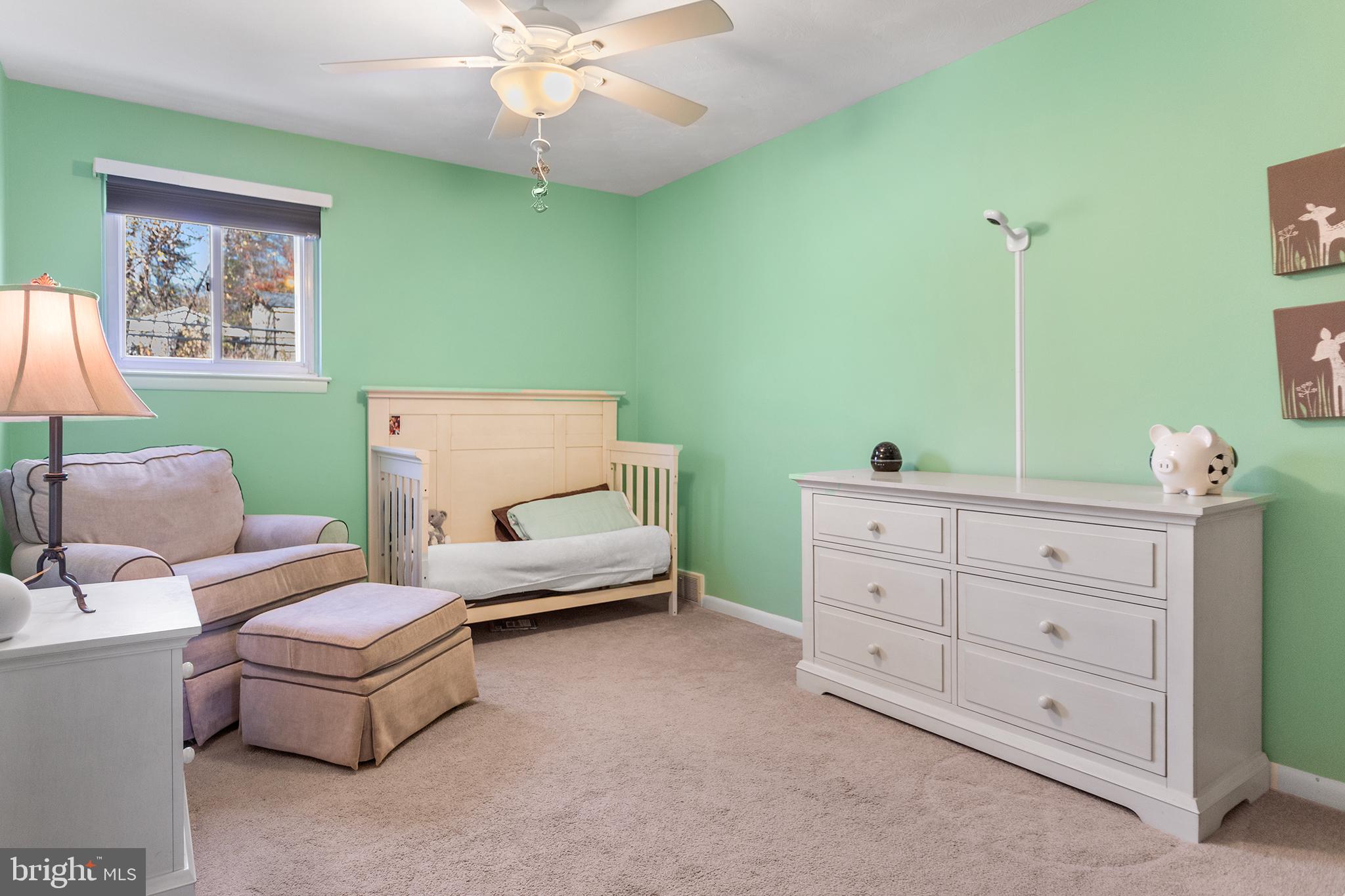 1725 Lawrence Road Havertown, PA 19083 - Photo 15 of 26 a living room with furniture and a chandelier