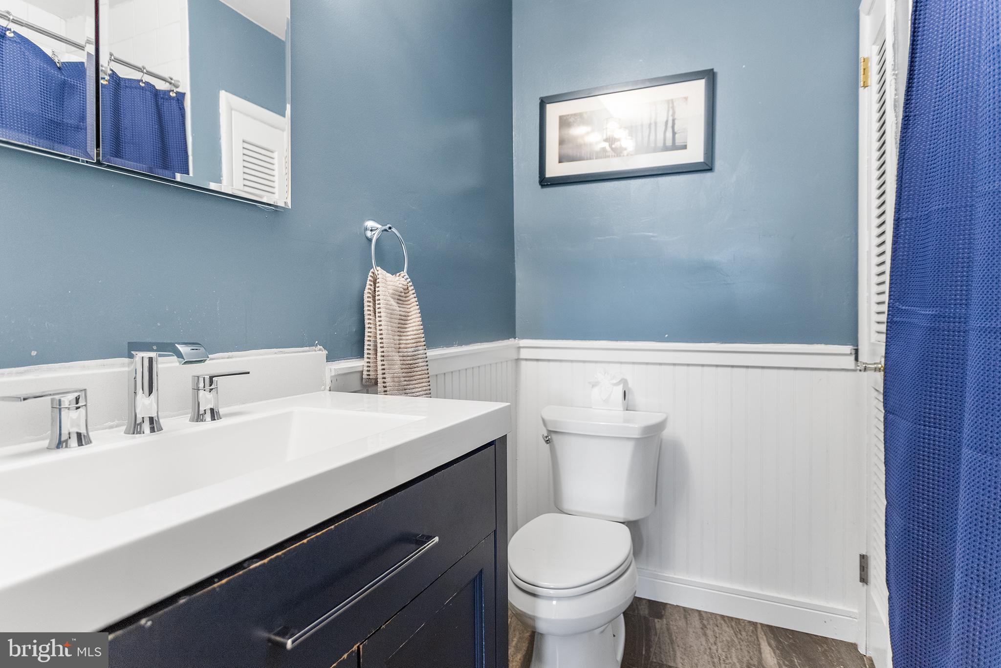 1725 Lawrence Road Havertown, PA 19083 - Photo 17 of 26 a bathroom with a sink and a toilet
