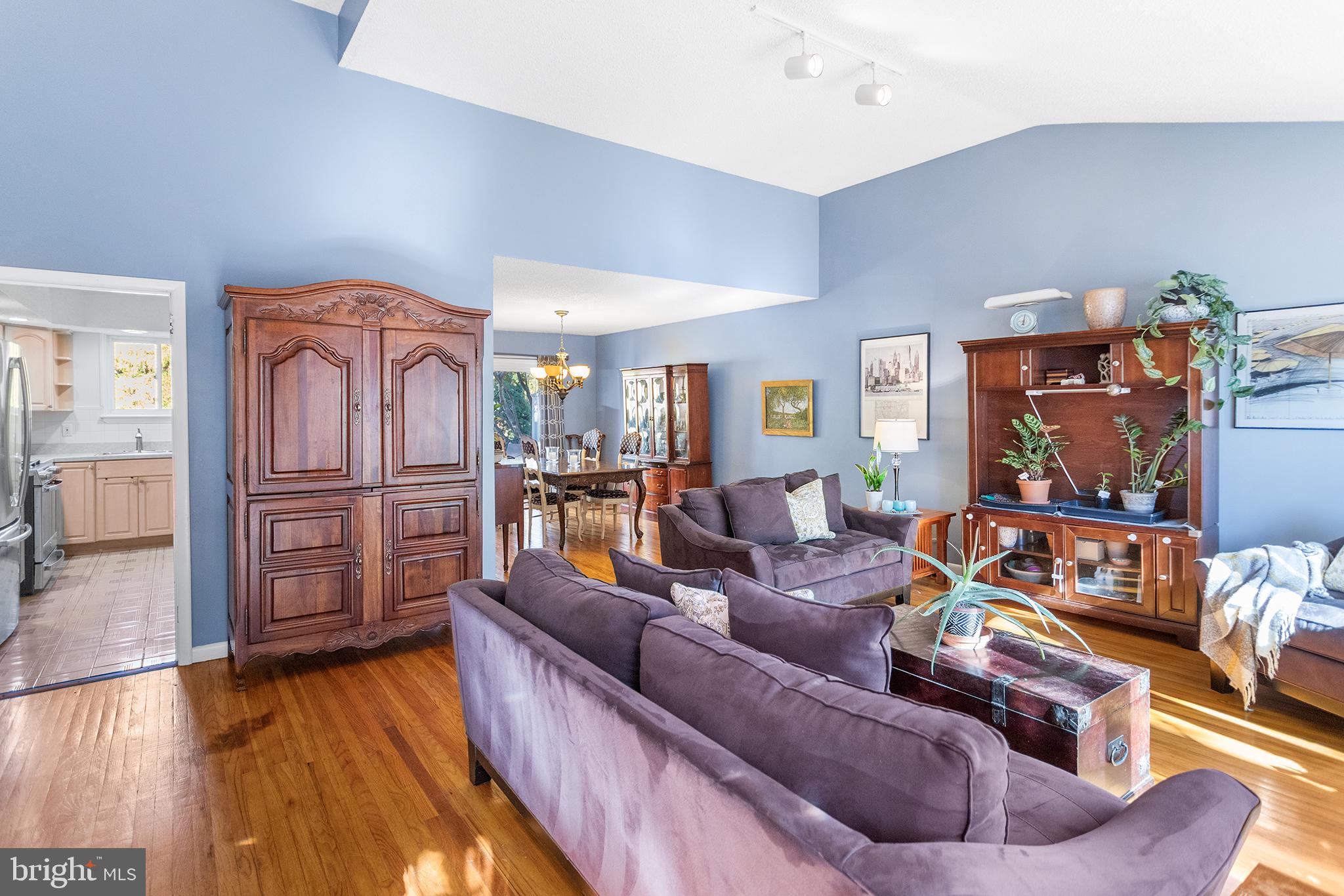 1725 Lawrence Road Havertown, PA 19083 - Photo 2 of 26 a living room with furniture and a wooden floor