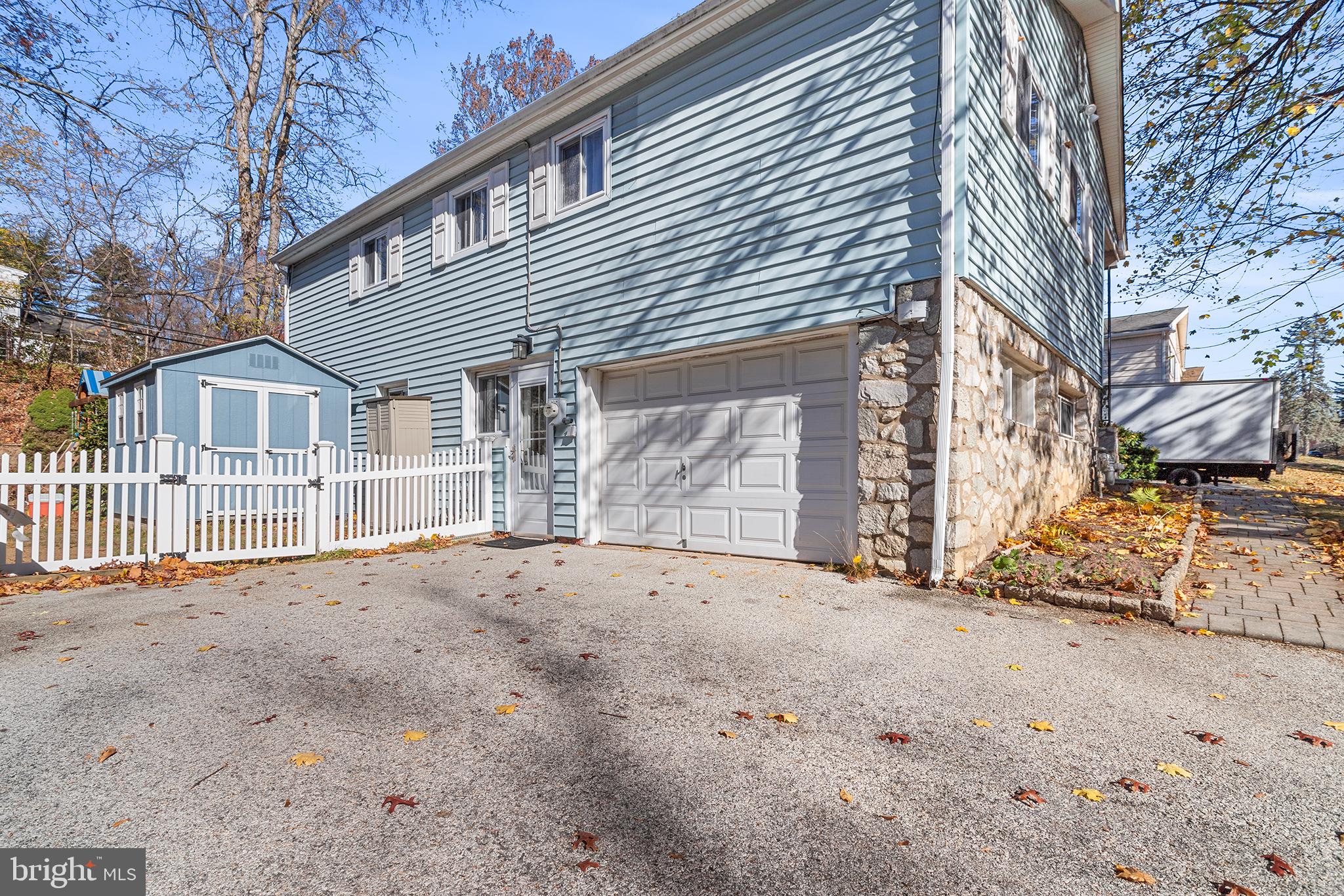 1725 Lawrence Road Havertown, PA 19083 - Photo 26 of 26 a front view of a house with a road