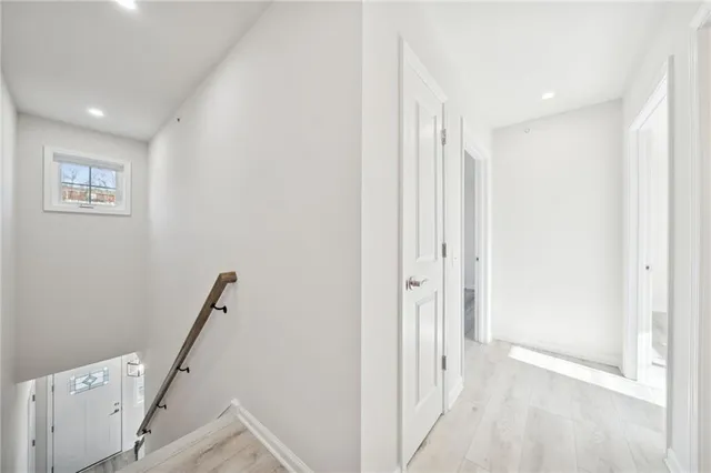 a view of a hallway with closet