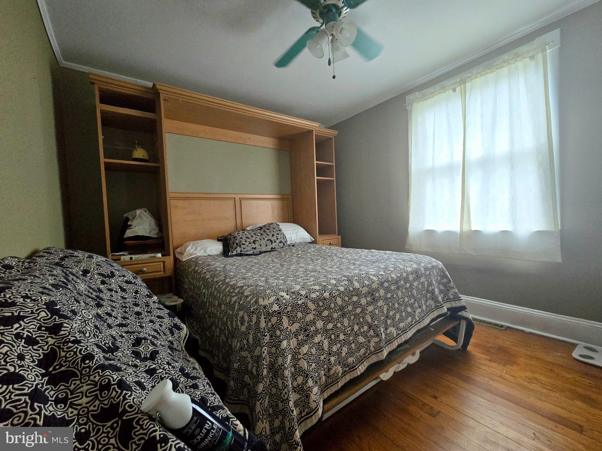 8453 Garden Road Pasadena, MD 21122 - Photo 14 of 58 main level bedroom with murphy bed (conveys)