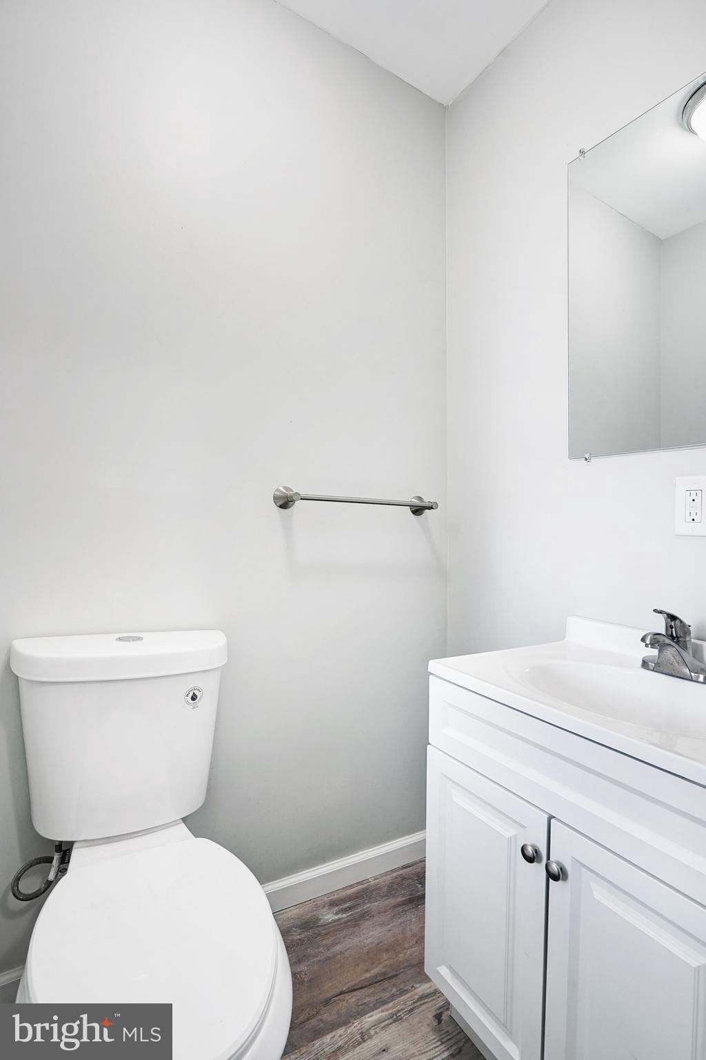 565 Line Street Camden, NJ 08103 - Photo 8 of 31 a white toilet sitting next to a bathroom sink