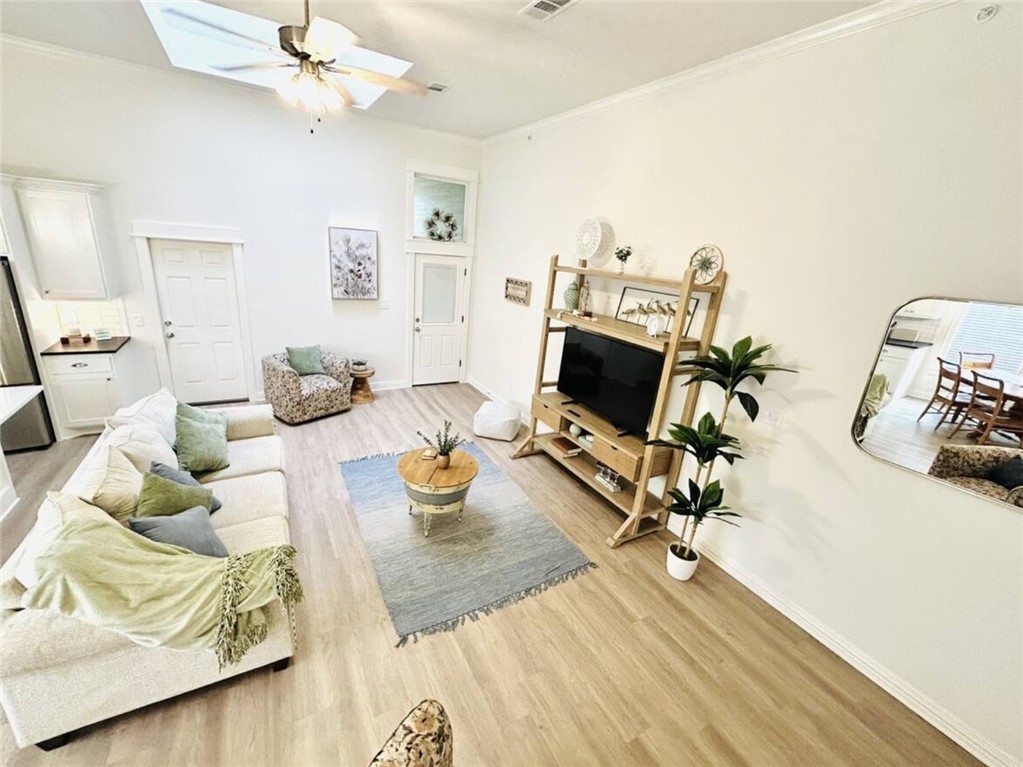 1536 Bennett Street Bryan, TX 77802 - Photo 13 of 35 Living room with light wood-style flooring, a ceil