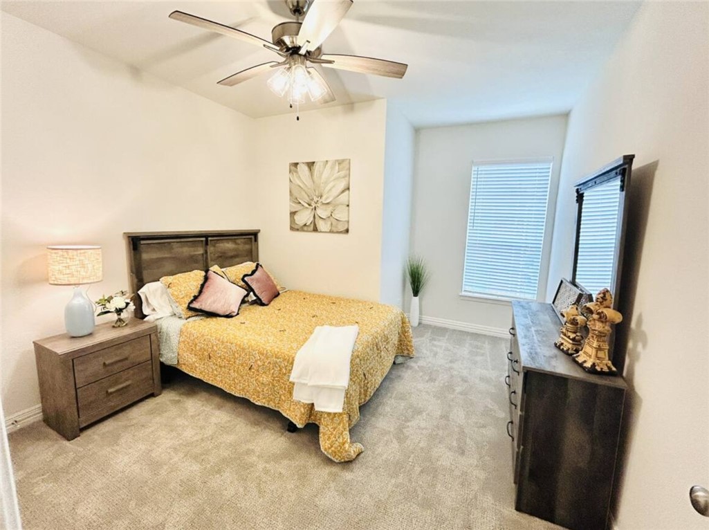 1536 Bennett Street Bryan, TX 77802 - Photo 31 of 35 Bedroom featuring light colored carpet, baseboards