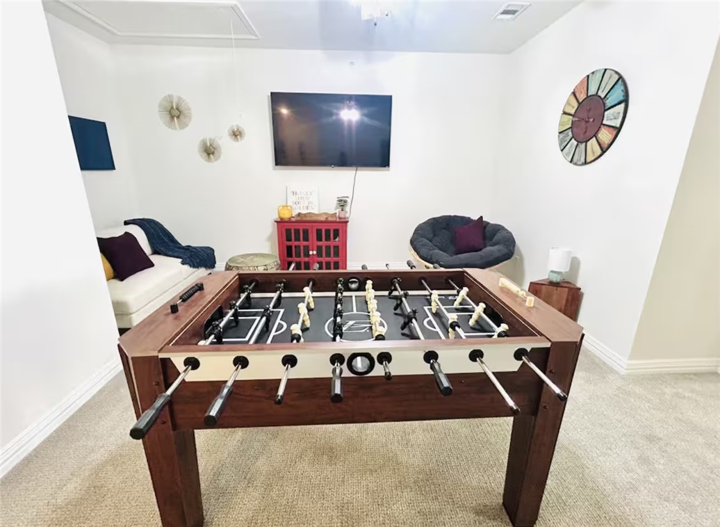 1536 Bennett Street Bryan, TX 77802 - Photo 35 of 35 Game room with carpet floors, attic access, and ba