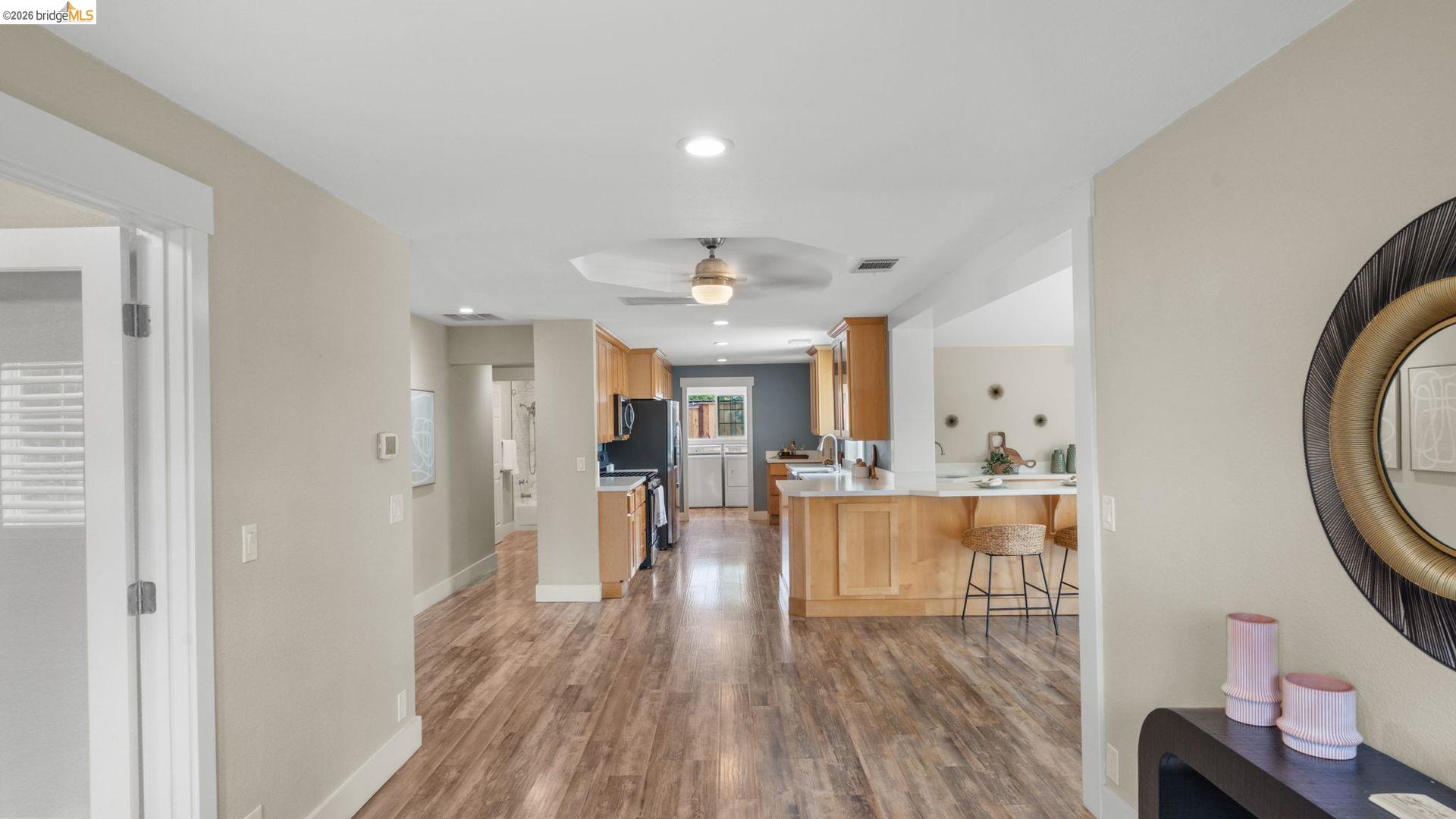 700 Brownstone Road Oakley, CA 94561 - Photo 13 of 58 Wood-finish flooring extending throughout the open-concept interior