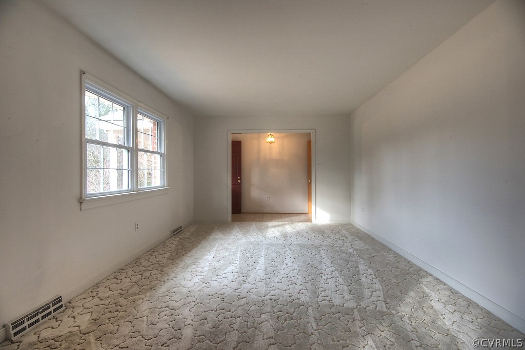 6416 Jessup Road Chesterfield, VA 23832 - Photo 8 of 37 an empty room with windows and closet