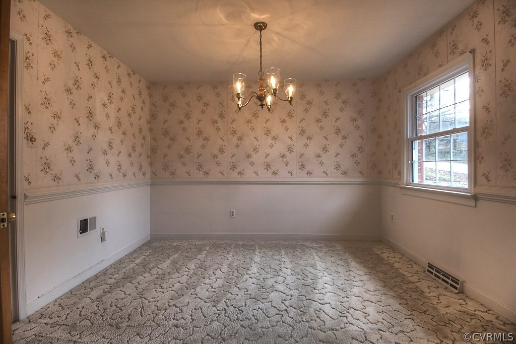 6416 Jessup Road Chesterfield, VA 23832 - Photo 9 of 37 a view of a chandelier in an empty room