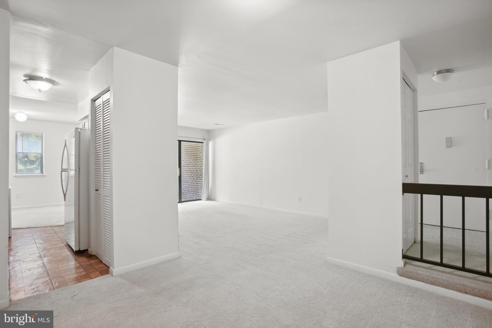 11240 Chestnut Grove Square, Unit 31 Reston, VA 20190 - Photo 22 of 26 View on the living room from dining room