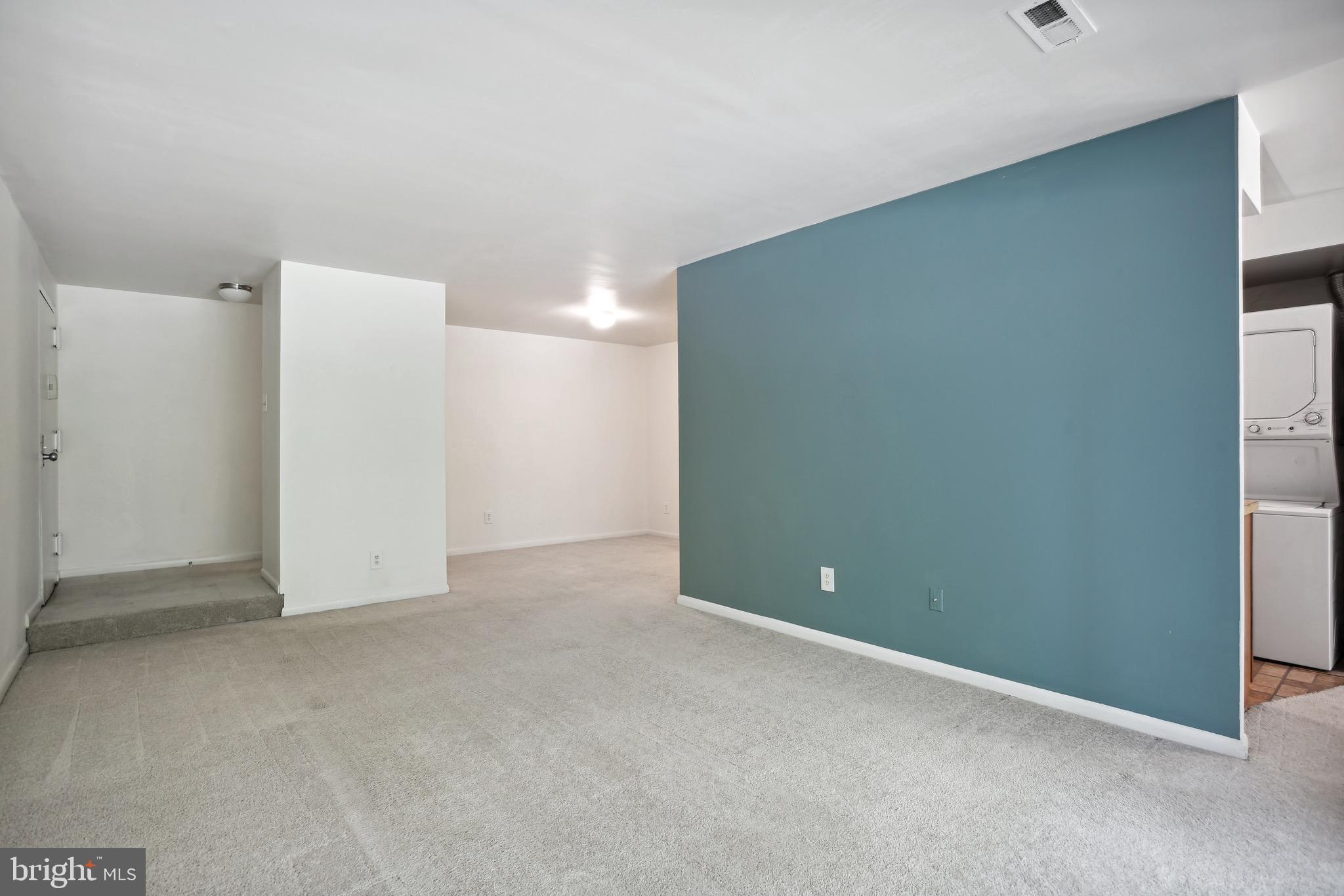 11240 Chestnut Grove Square, Unit 31 Reston, VA 20190 - Photo 8 of 26 Living room with a view on dining room