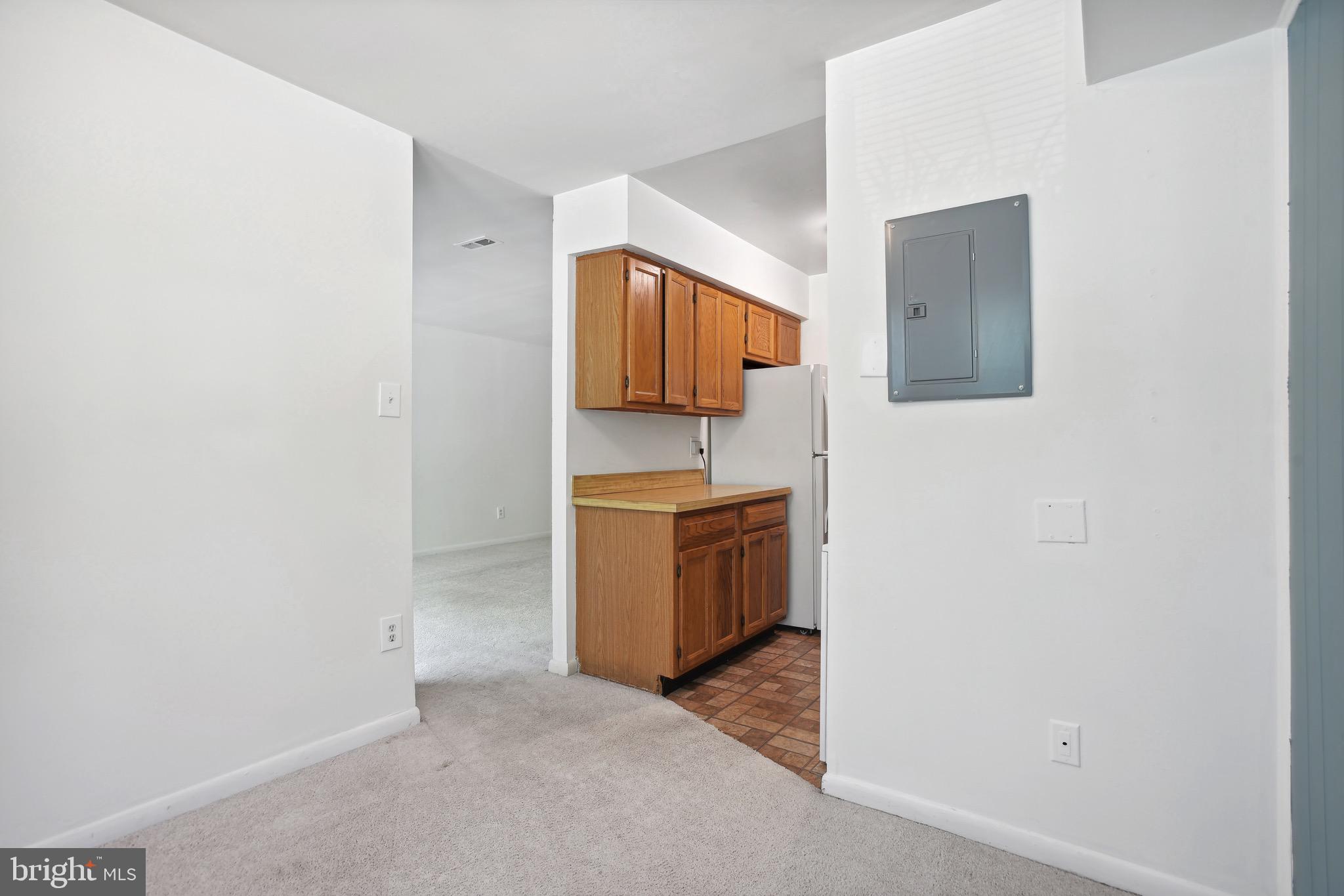 11240 Chestnut Grove Square, Unit 31 Reston, VA 20190 - Photo 9 of 26 View on the kitchen from the hallway