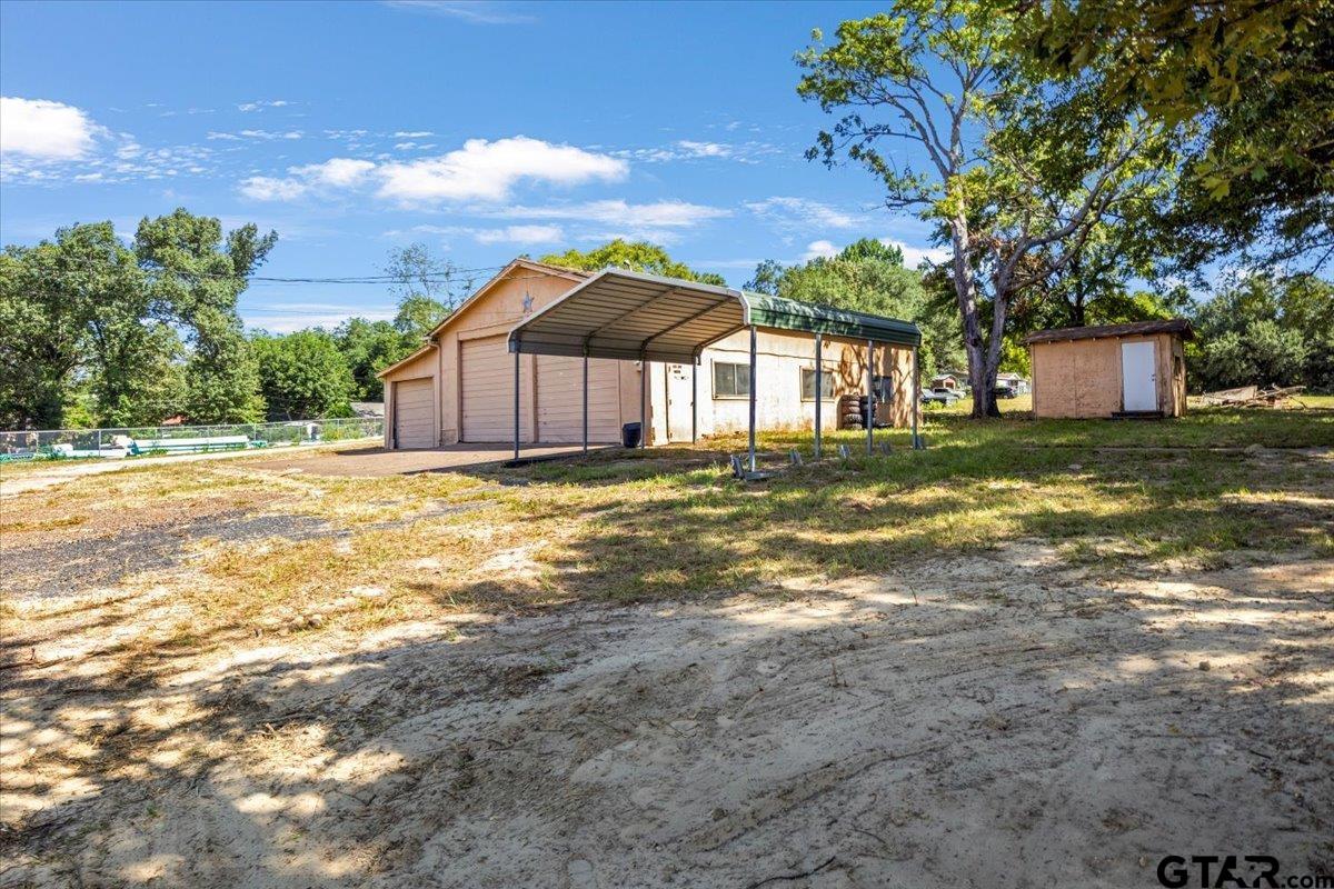 6521 Highway 271 Tyler, TX 75708 - Photo 28 of 35 a view of a house with a yard