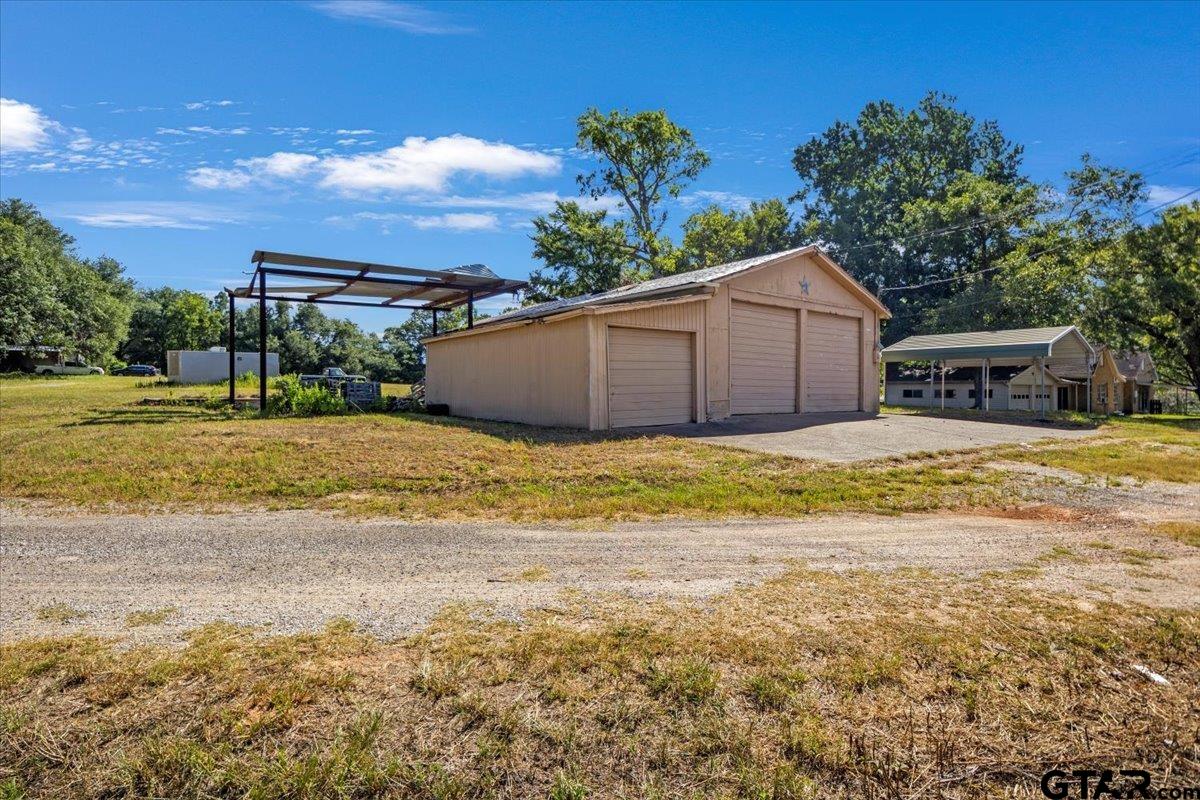 6521 Highway 271 Tyler, TX 75708 - Photo 30 of 35 a view of a house with a big yard