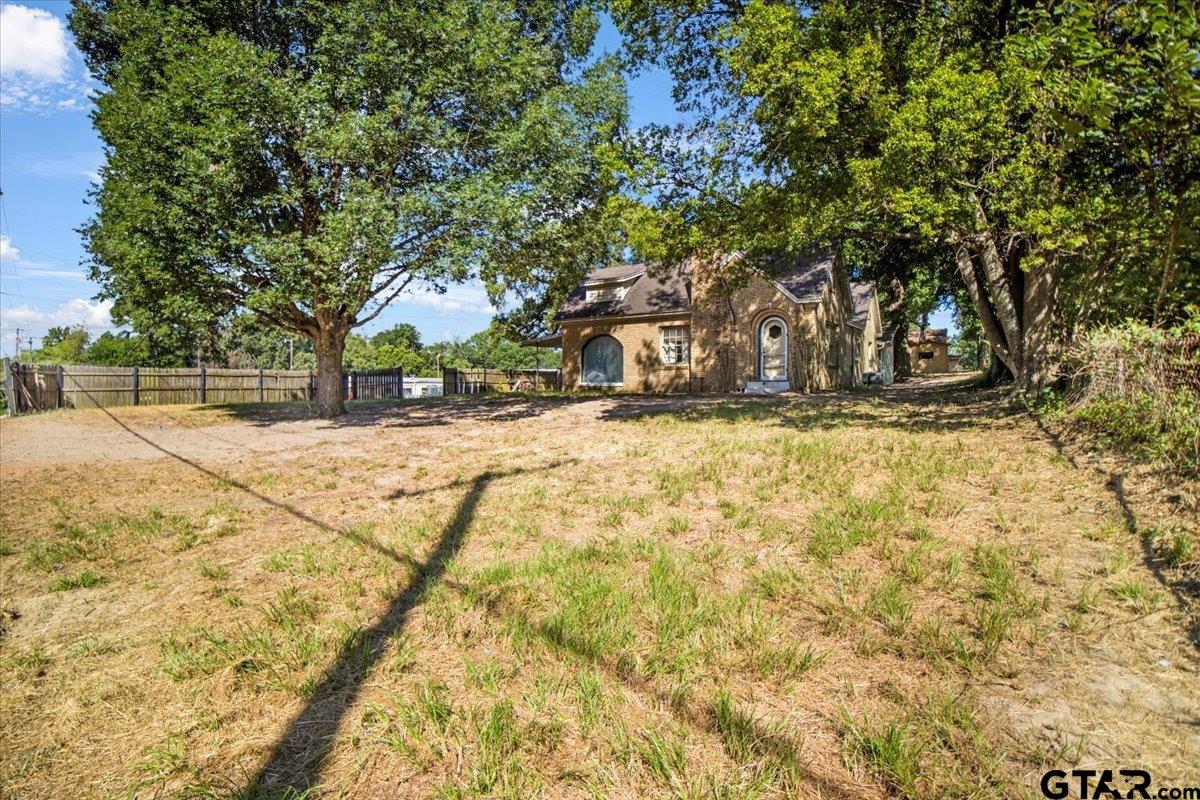6521 Highway 271 Tyler, TX 75708 - Photo 3 of 35 a view of a yard with a tree