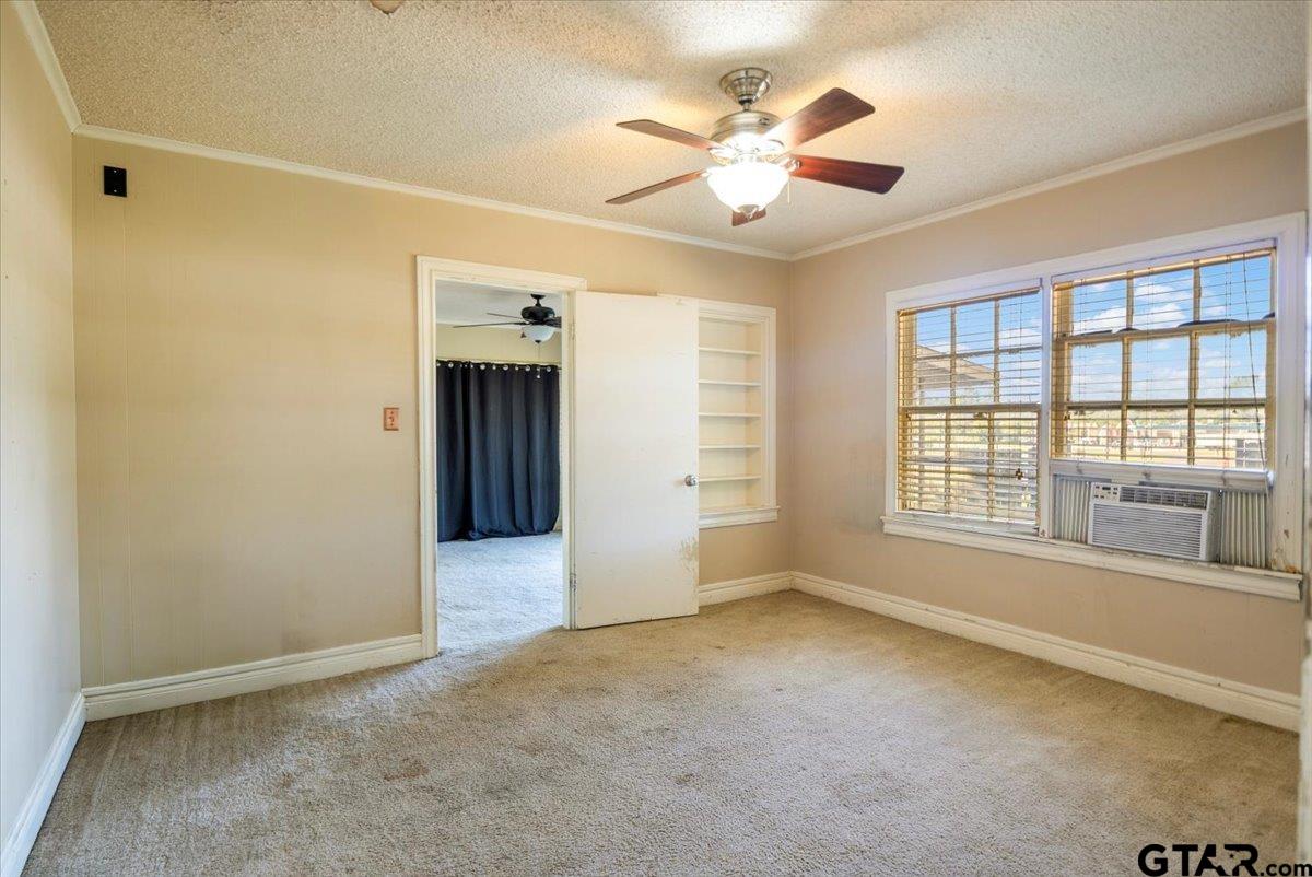6521 Highway 271 Tyler, TX 75708 - Photo 10 of 35 a view of an empty room with a window